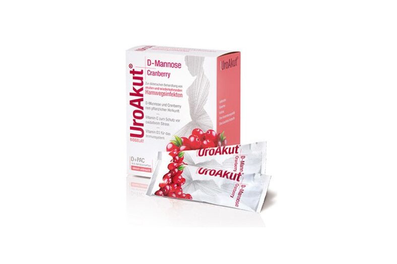 Verpackung von UroAkut mit D-Mannose und Cranberry für die Behandlung von Harnwegsinfekten, zwei stickstoffförmige Beutel sichtbar.