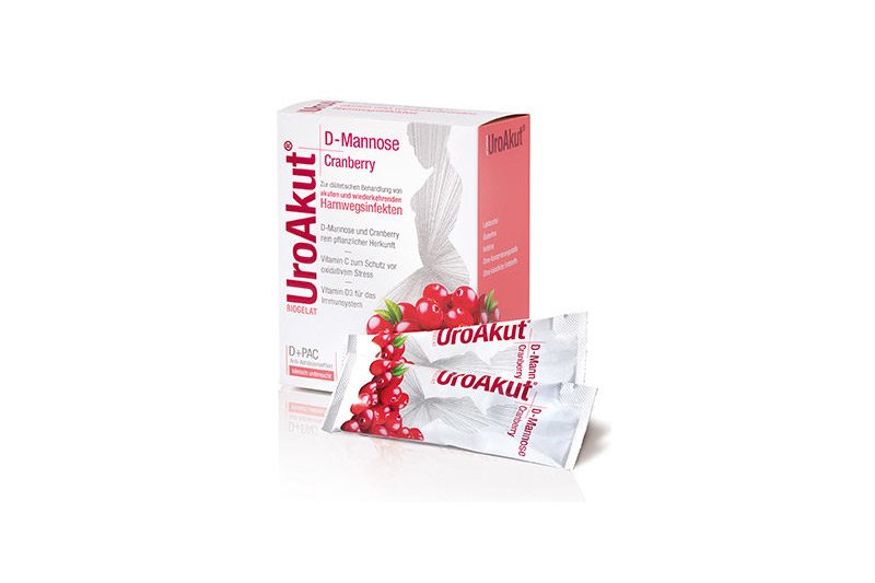 Verpackung von UroAkut mit D-Mannose und Cranberry für die Behandlung von Harnwegsinfekten, zwei stickstoffförmige Beutel sichtbar.